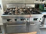 a stainless steel stove and oven in a kitchen