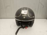 an image of a helmet with a tag on it sitting on a table