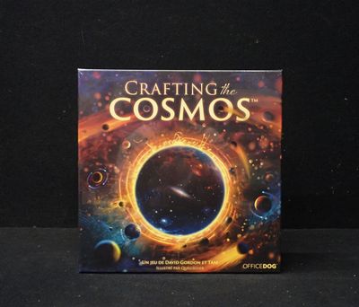 a book with a picture of a black hole in the middle of it