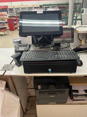 a desktop computer sitting on top of a desk in a store