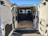 a white van that is parked in the parking lot