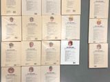 a lot of baseball cards that are on the wall