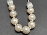 pearl and silver beaded necklace with tassel