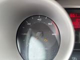 a close up of a car dashboard with a speedometer