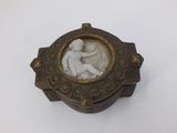 an image of a small box with a statue in it