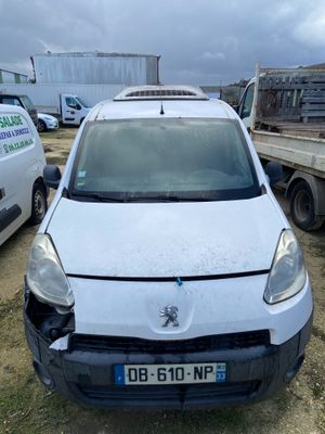 a white van that is parked in a lot