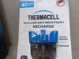 a package of thermacell on the back of a car seat