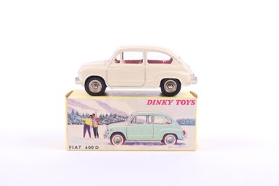 a small toy car sitting on top of a box