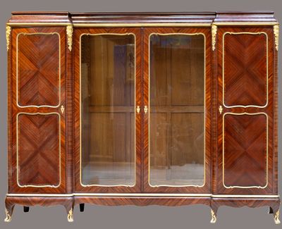 Importante bibliothèque en bois de placage marqueté elle ouv…