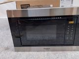 Vente d'un four à micro-ondes neuf, avec son emballage d'origine et sa notice d'utilisation