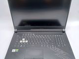 a laptop computer that is sitting on a table