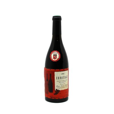 the bottle of wine is full of red wine on a white background