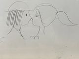 a drawing of a couple kissing each other on the wall