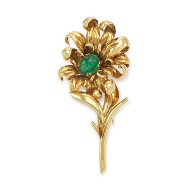 a gold and emerald flower broochle