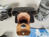 many different types of cameras on the table