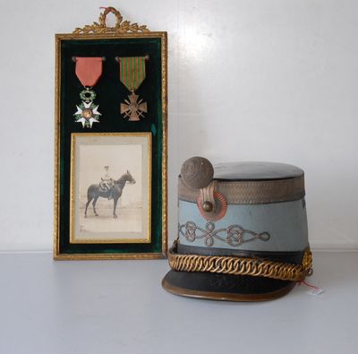 a hat that is sitting next to a picture of a horse