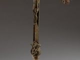 an ornate cross with a crucif on top of it