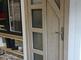 a door with a sign on it that says design fermoires