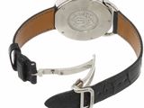 an image of a close up of a wrist watch with a leather strap