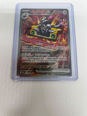 a close up of a card in a plastic case on a table
