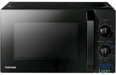 un four à micro-ondes noir posé sur un comptoir blanc