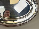a man taking a picture of himself in a mirror