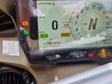 a close up of a car dashboard with a gps device