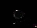 a crystal ball sitting on a table in the dark