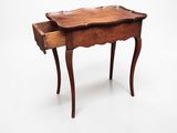 an image of a small wooden table with a drawer underneath it