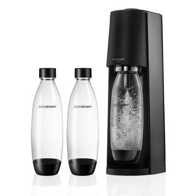 two bottles of soda are next to each other on a white surface