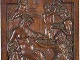 une plaque en bois sculpté représentant une scène de la vie de Jésus