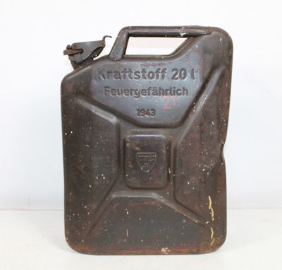 a black jerry can with a metal handle on a white surface