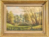 an image of a painting of a river and trees in a gold frame