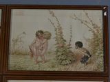 three framed pictures of a boy and a girl in a field