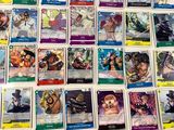 a lot of cards that are on the table