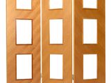 a room divider made of wood with four squares on each side