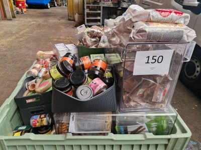 a bin full of food that is sitting in the street
