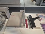 a stapler and a stapler on a table in a room