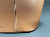 leather tote bag with zippered closure and zippered interior