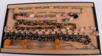 a box with many different types of bracelets in it