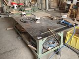 a workbench in a garage with tools on it
