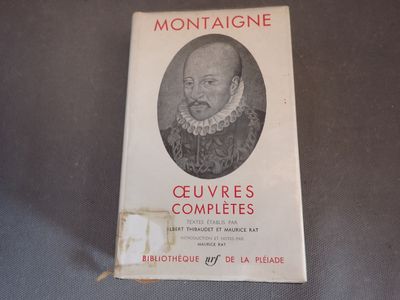 la couverture d'un livre sur laquelle figure la photo d'un homme barbu
