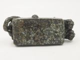 an image of a stone object on a white background