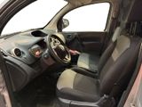 the interior of a small car with a steering wheel and dashboard