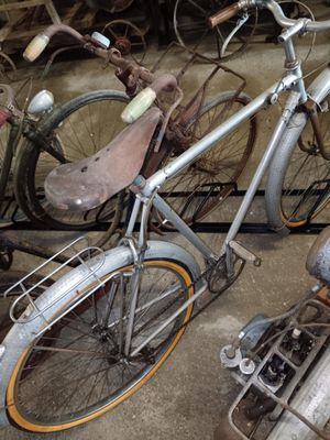 a bike that is parked next to other bikes