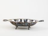an image of a metal bowl with handles on a white background
