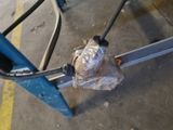 a bag of food sitting on top of a metal table