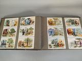 a book with pictures of people and animals on it