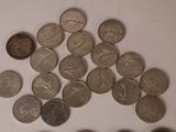 a lot of coins that are on a table