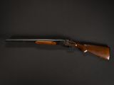 a rifle on a black background